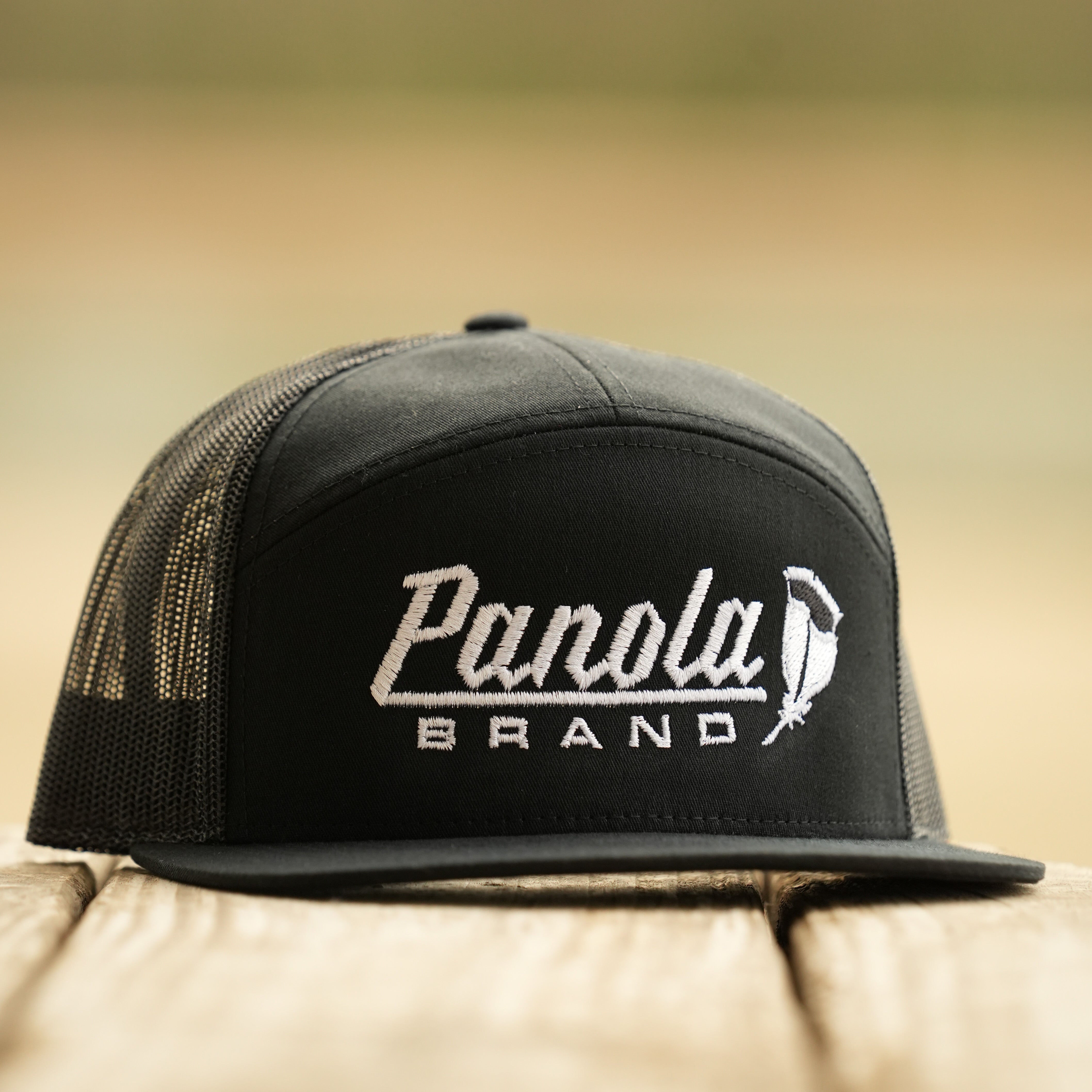 Panola Feather Logo 7-Panel Trucker Hat