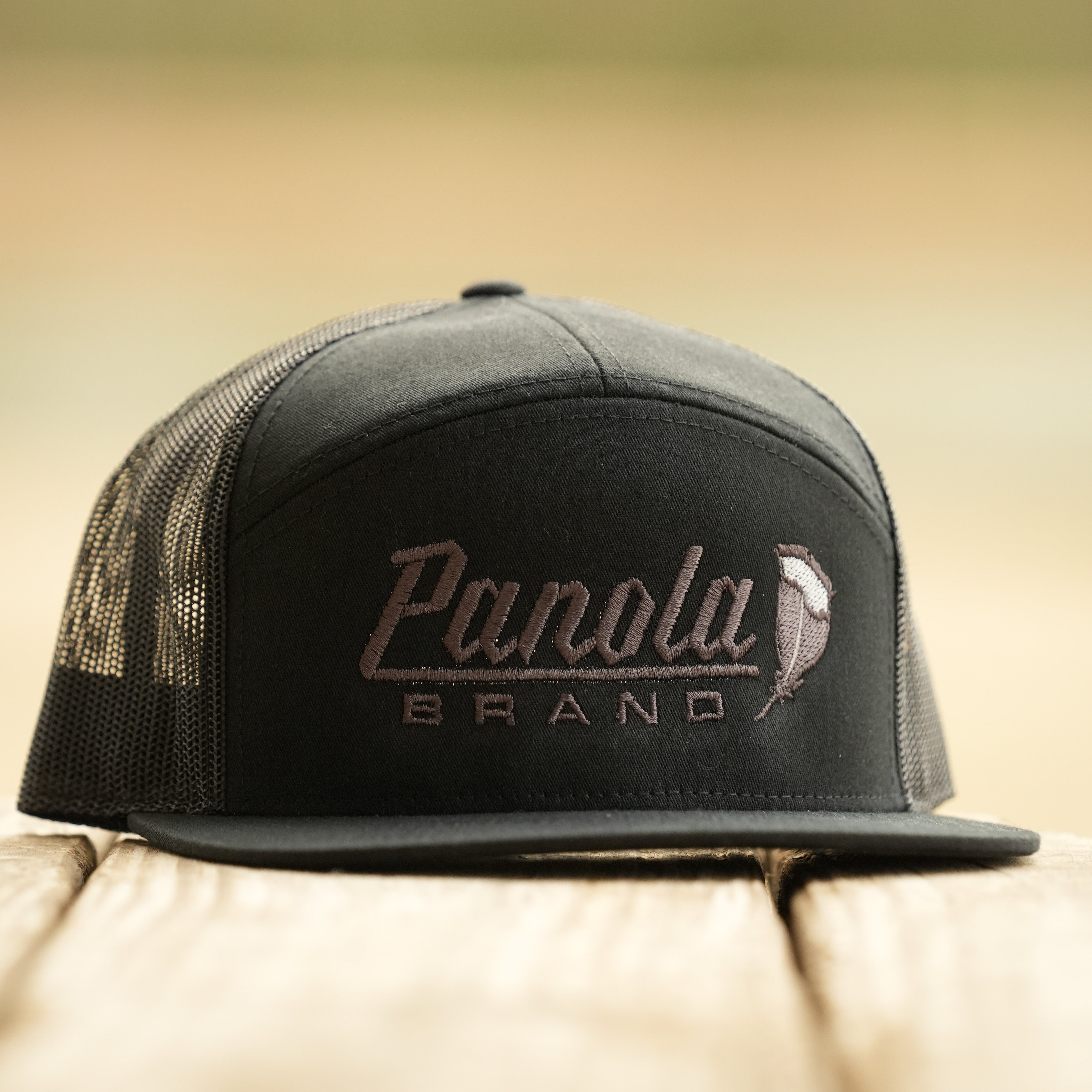 Panola Feather Logo 7-Panel Trucker Hat