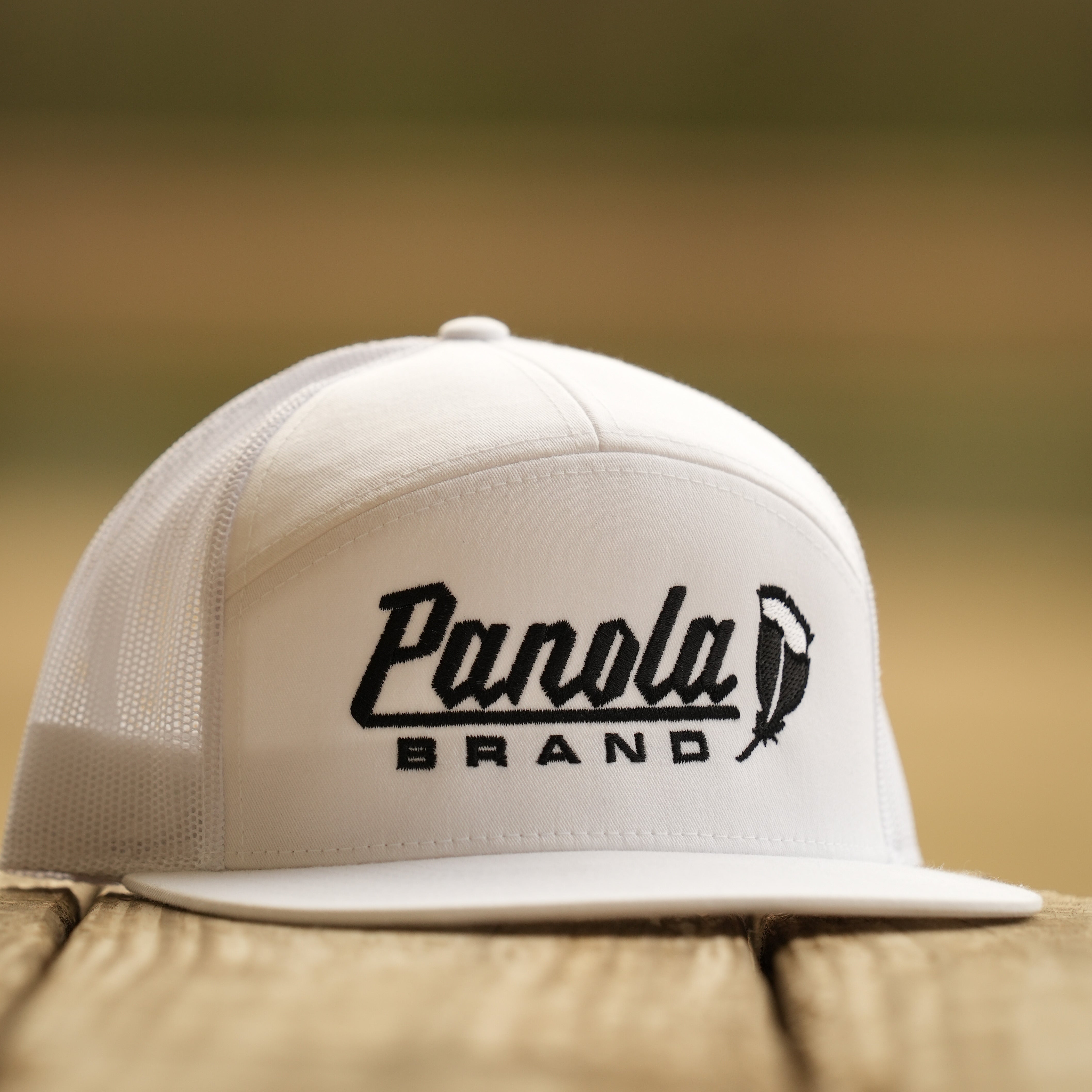 Panola Feather Logo 7-Panel Trucker Hat
