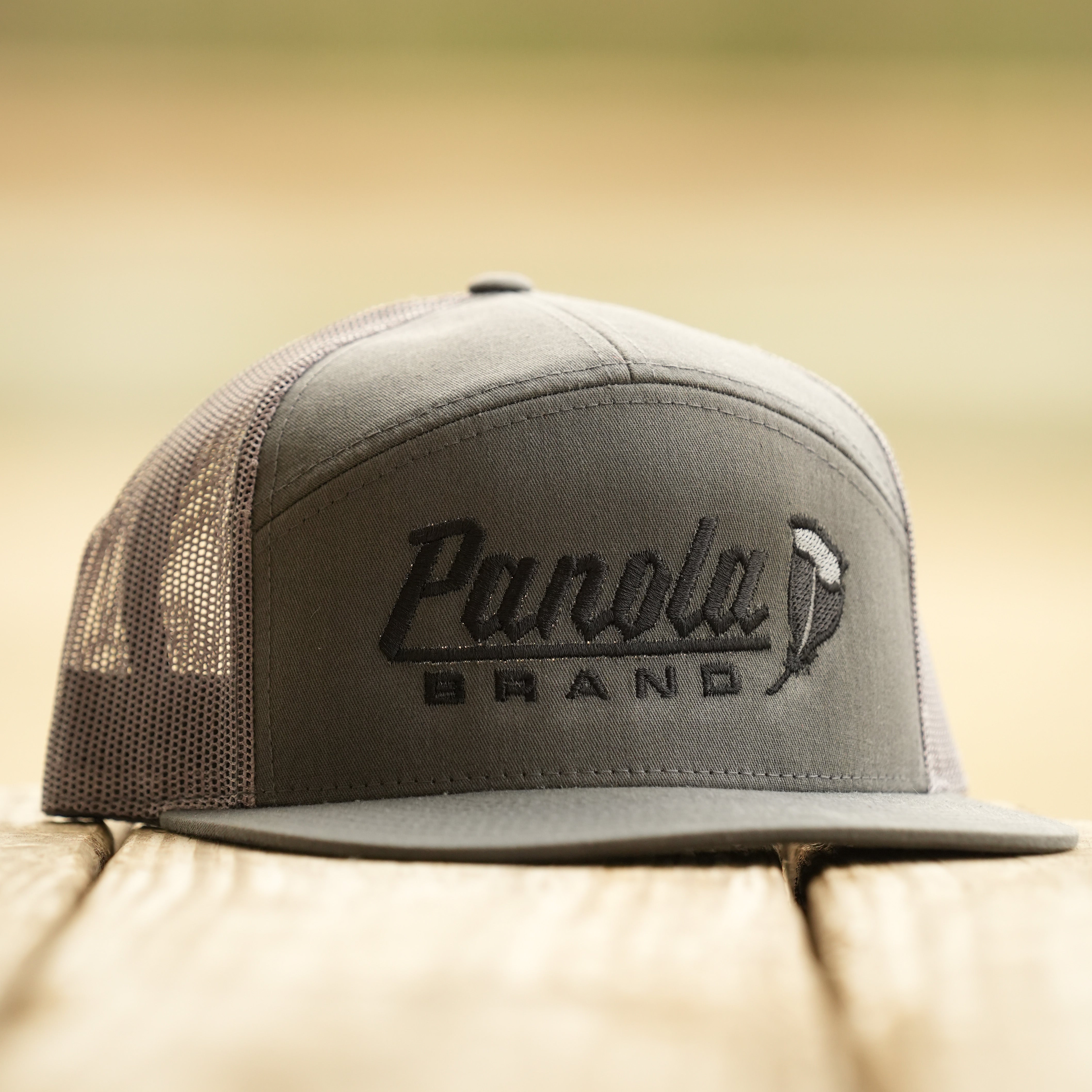Panola Feather Logo 7-Panel Trucker Hat